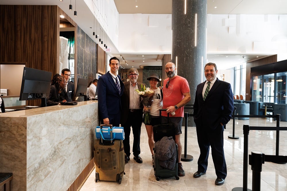 The first guests of the Riu Plaza Chicago with Luis Miguel Catena, Manager of Riu Plaza Chicago; Alejandro Sanchez, Manager of US and English Caribbean Operations; and Manuel Donoso, Sales Manager for Riu Plaza Miami Beach and Riu Plaza Chicago.